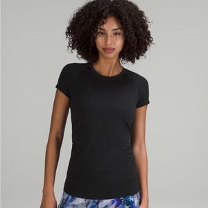 Black lululemon swiftly tech t-shirt, size 4